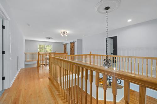 Red oak floors in a hallway loft