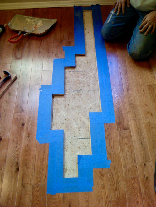 Hardwood floor repair in progress