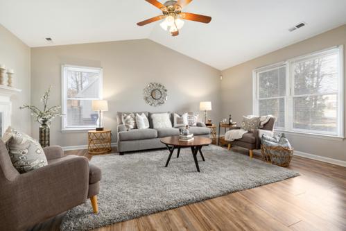Living room with teak prefinished hardwood floors